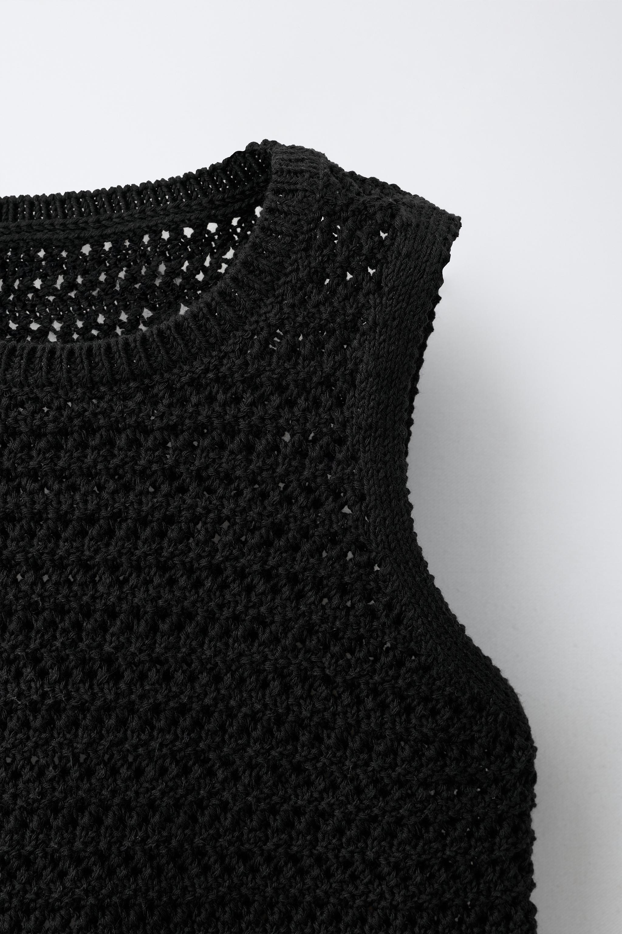 TOP EN MAILLE À FRANGES
